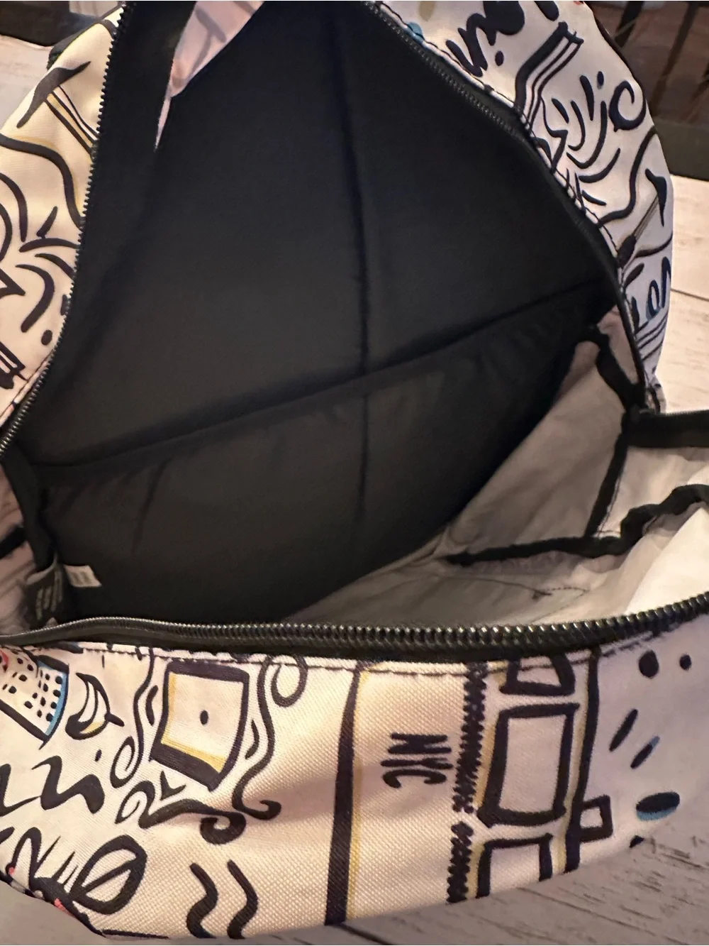 FRIENDS White Backpack with Black Accents and Multicolor Doodles